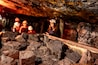 Selective focus on anthracite coal on a hopper with defocused group in the Lackawanna Coal Mine Tour at McDade Park.