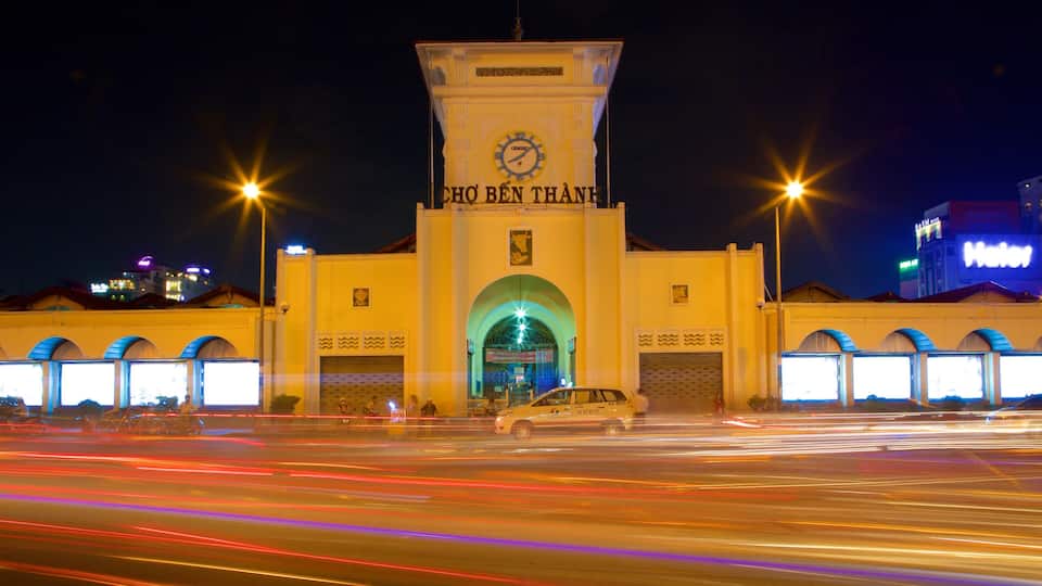 Ben Thanh Market which includes heritage architecture, signage and night scenes