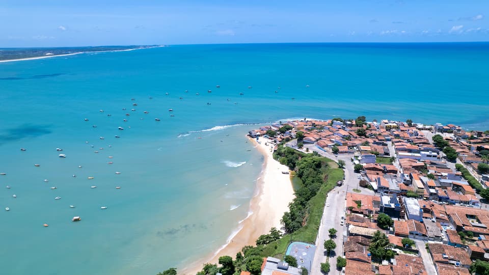 A coastal town with a beach and ocean.