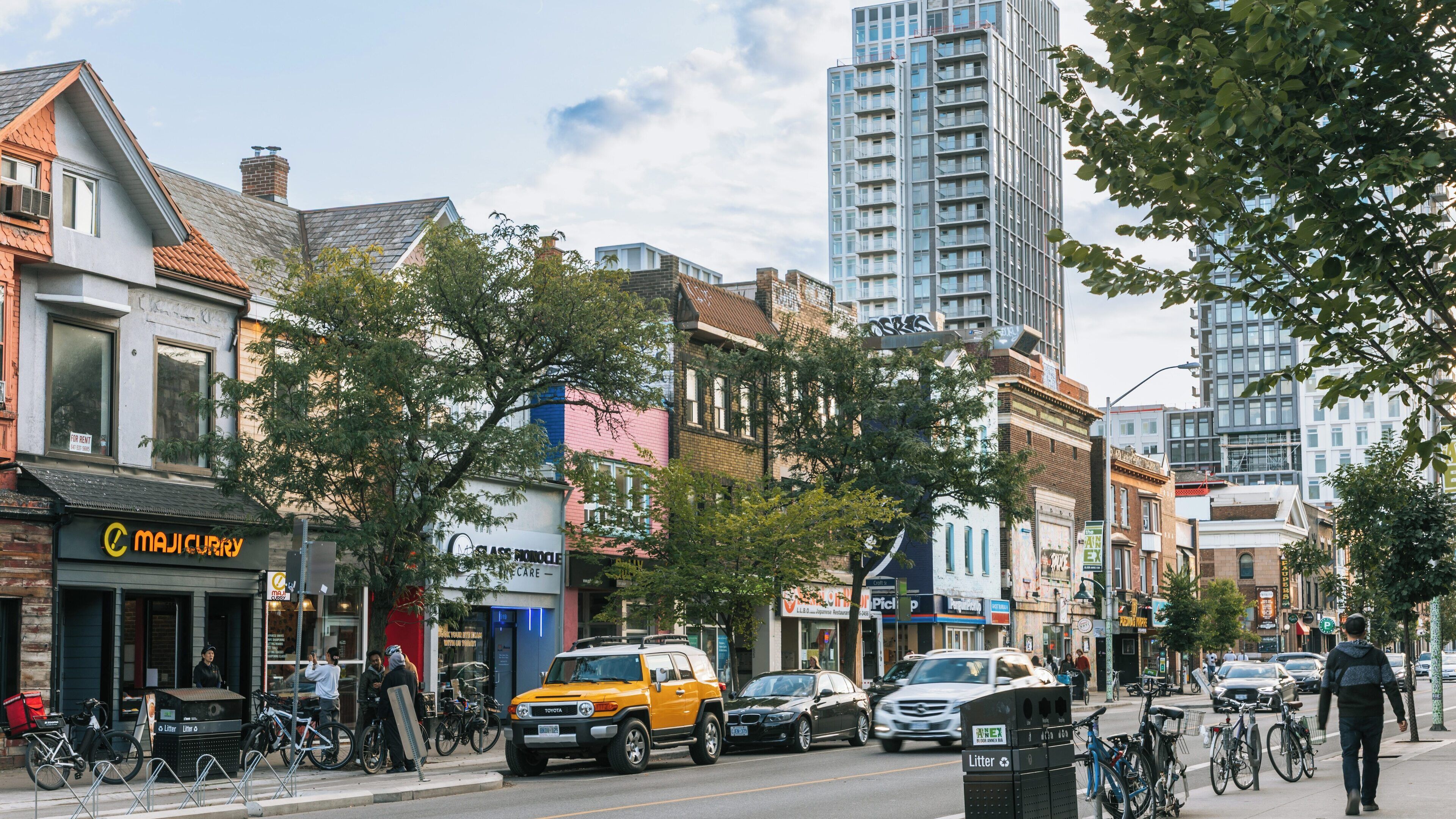 Chinatown Centre in Downtown Toronto showcases vibrant street life with shops, eateries, and city architecture under a bright sky