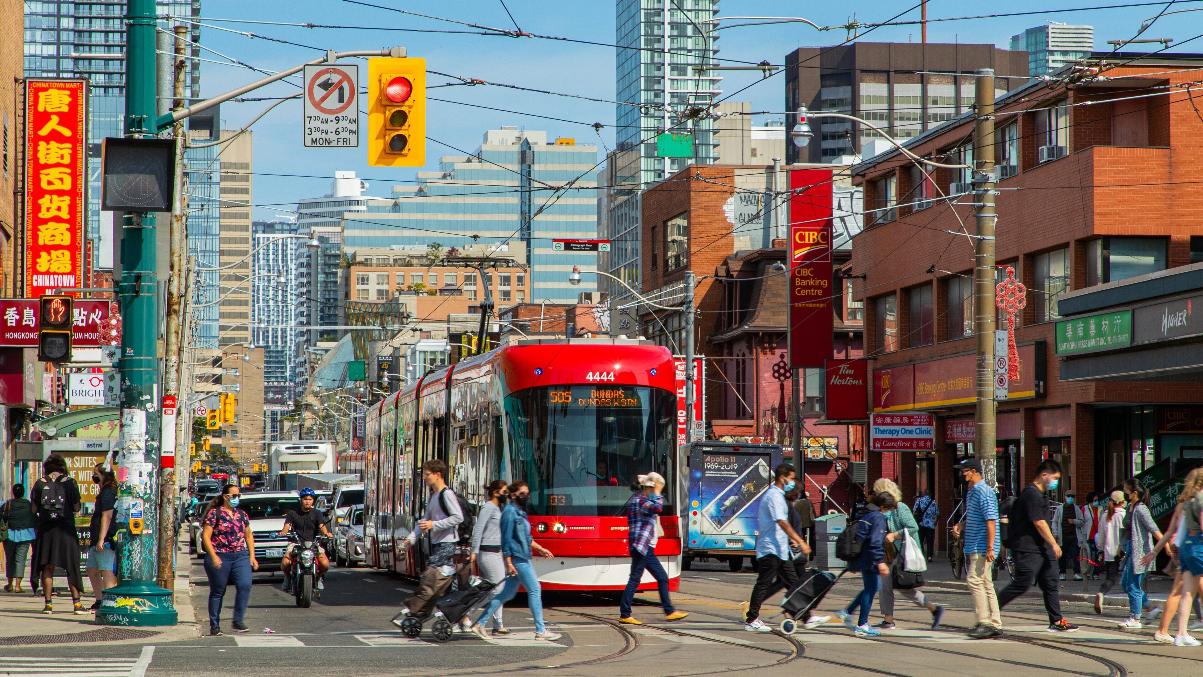 Chinatown Centre featuring a city and street scenes as well as a small group of people