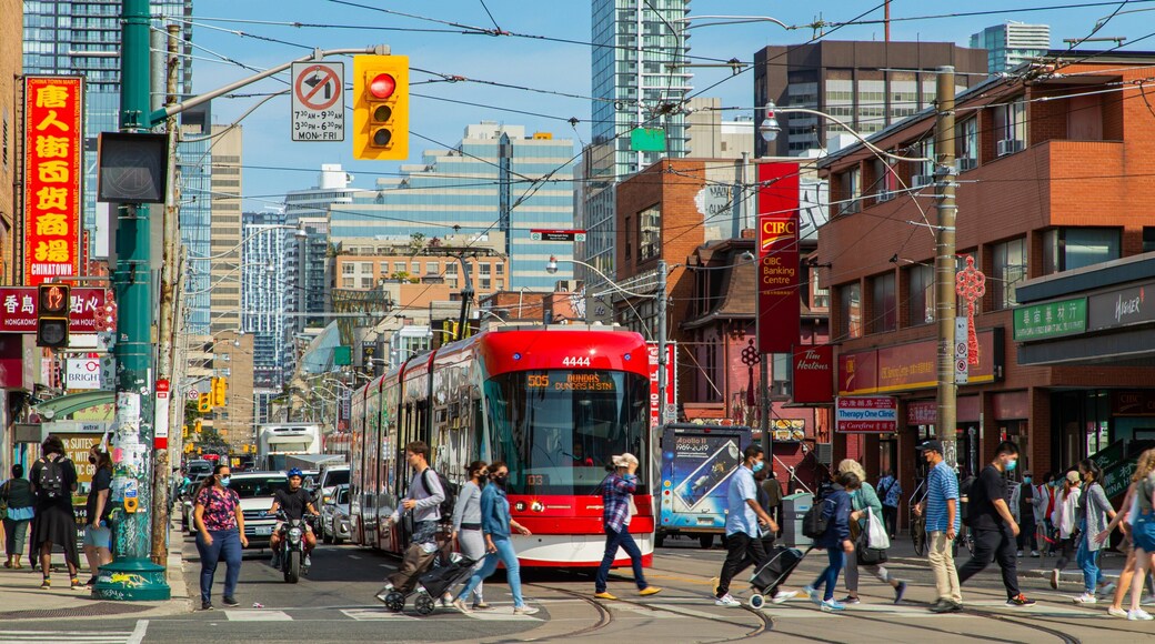 Chinatown Centre featuring a city and street scenes as well as a small group of people