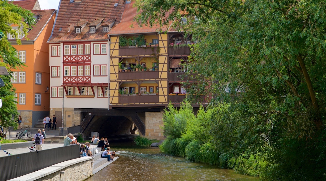 Kramerbrucke showing heritage elements and a river or creek as well as a small group of people