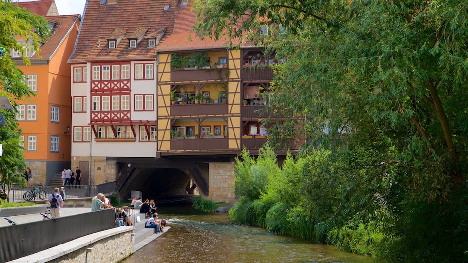 Kramerbrucke featuring heritage elements and a river or creek as well as a small group of people