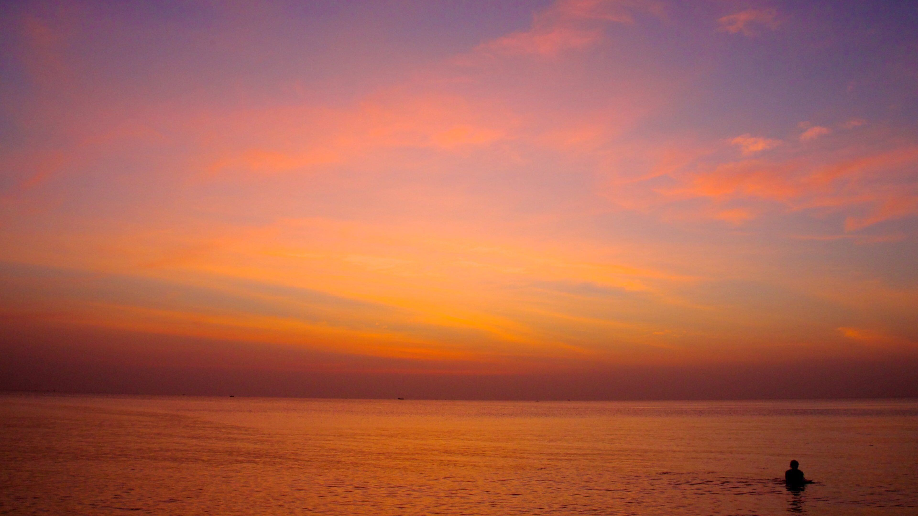 Phu Quoc Beach which includes landscape views, general coastal views and a sunset