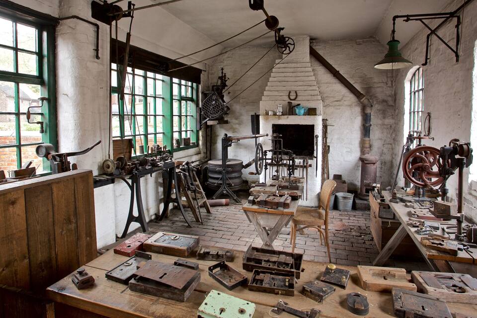 An old workshop with various tools and machinery.