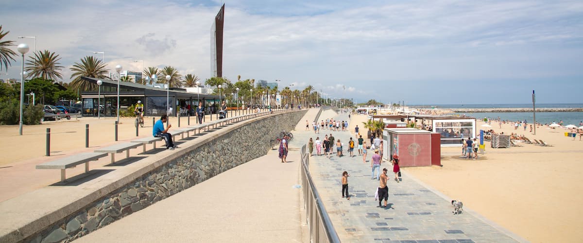 Bogatell Beach which includes a beach and general coastal views