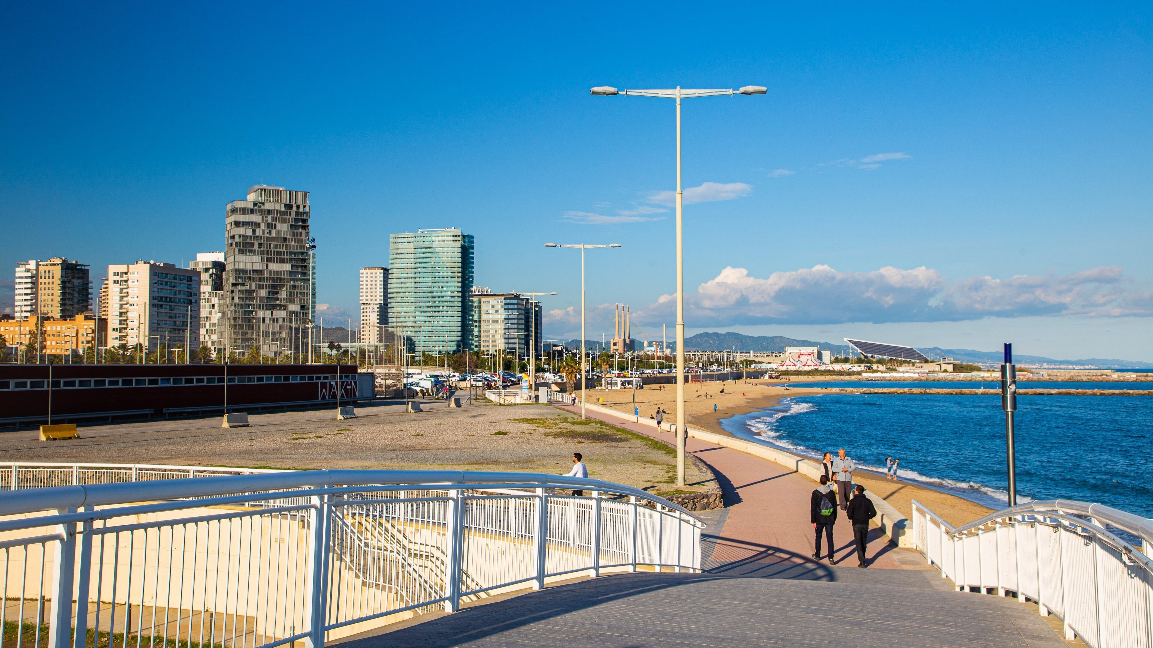 Bogatell Beach showing general coastal views and a coastal town
