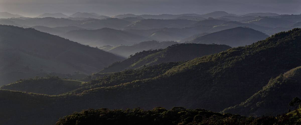 A mountainous landscape with rolling hills and valleys.