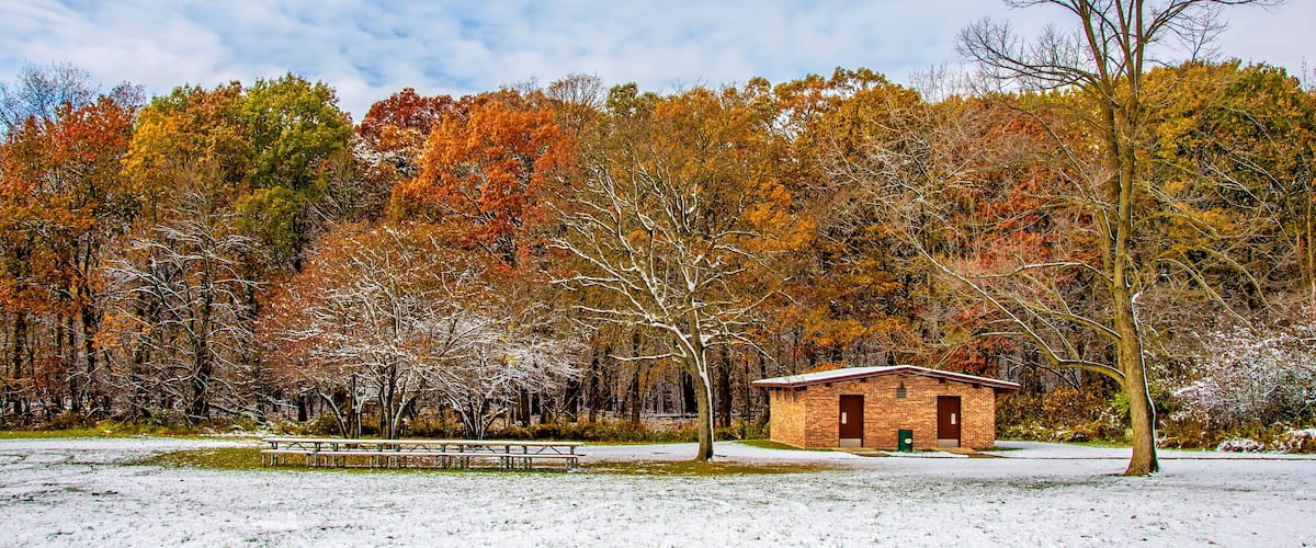 Ned Brown Preserve (Busse Woods) view with snow and autumn colors in Arlington Heights Town of Illinois