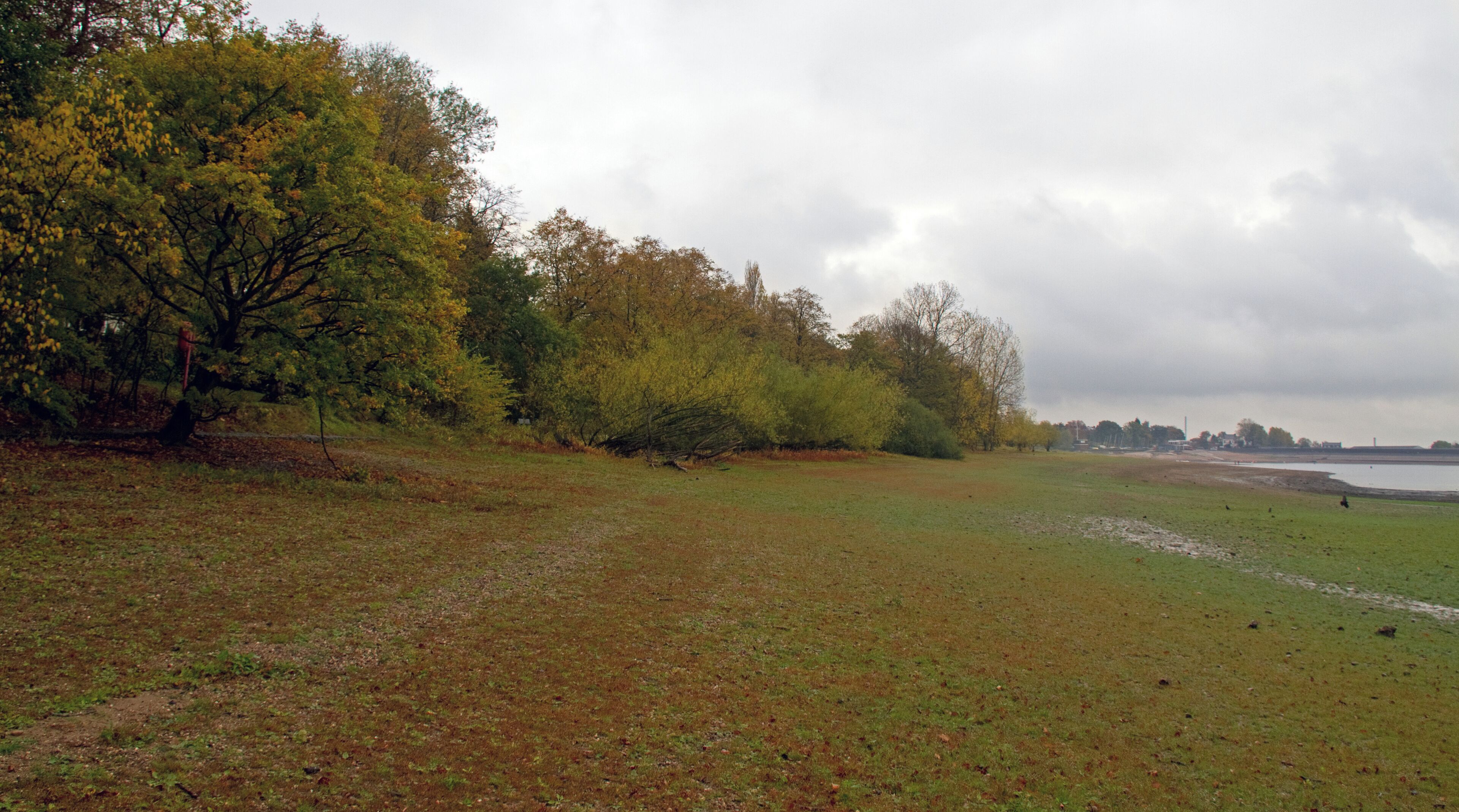 A dry summer has left the reservoir nearly empty. All the shoreline in the photo should be under water.