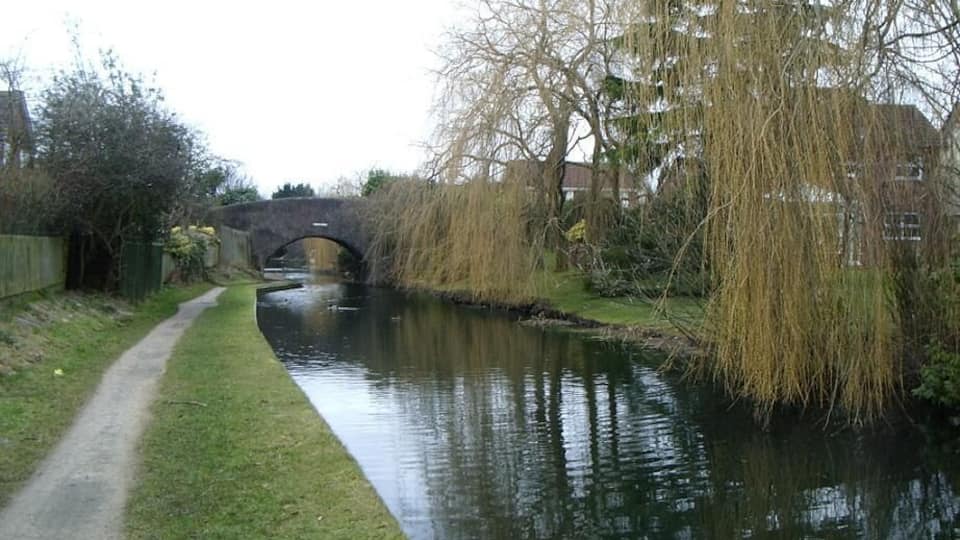 Birmingham and Fazeley Canal, Dickens Bridge View west towards Dickens Bridge, across from gardens bordering canal
