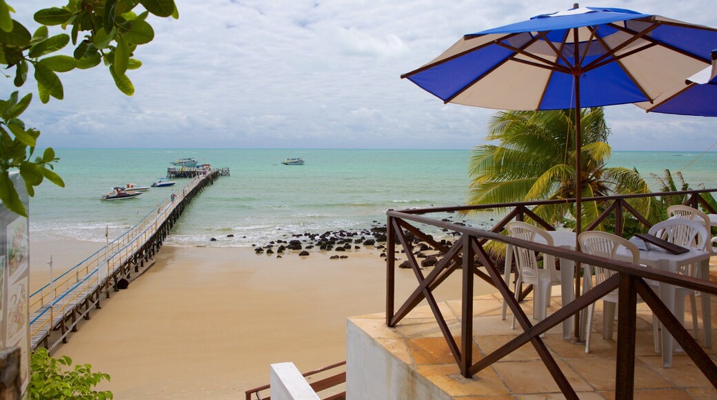 Pirangi Beach which includes general coastal views and a beach