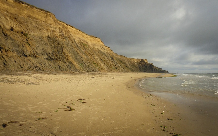 I remember walking along the beach in north #Jutland, close to the small Danish town of Lønstrup. An eroding coast line has caused the cliffs to recede, and so, atop the cliffs there were several abandoned structures. Staring out into the North Sea on that windy day was a surreal experience and reminded me that the world can open up opportunities in funny ways. A year earlier, I met some people at a course in Ann Arbor, Michigan. We were all from different cities and areas of the world. A year later, we found ourselves in northern #Denmark. Life is a funny thing.
#Europe #Travel #Lonstrup