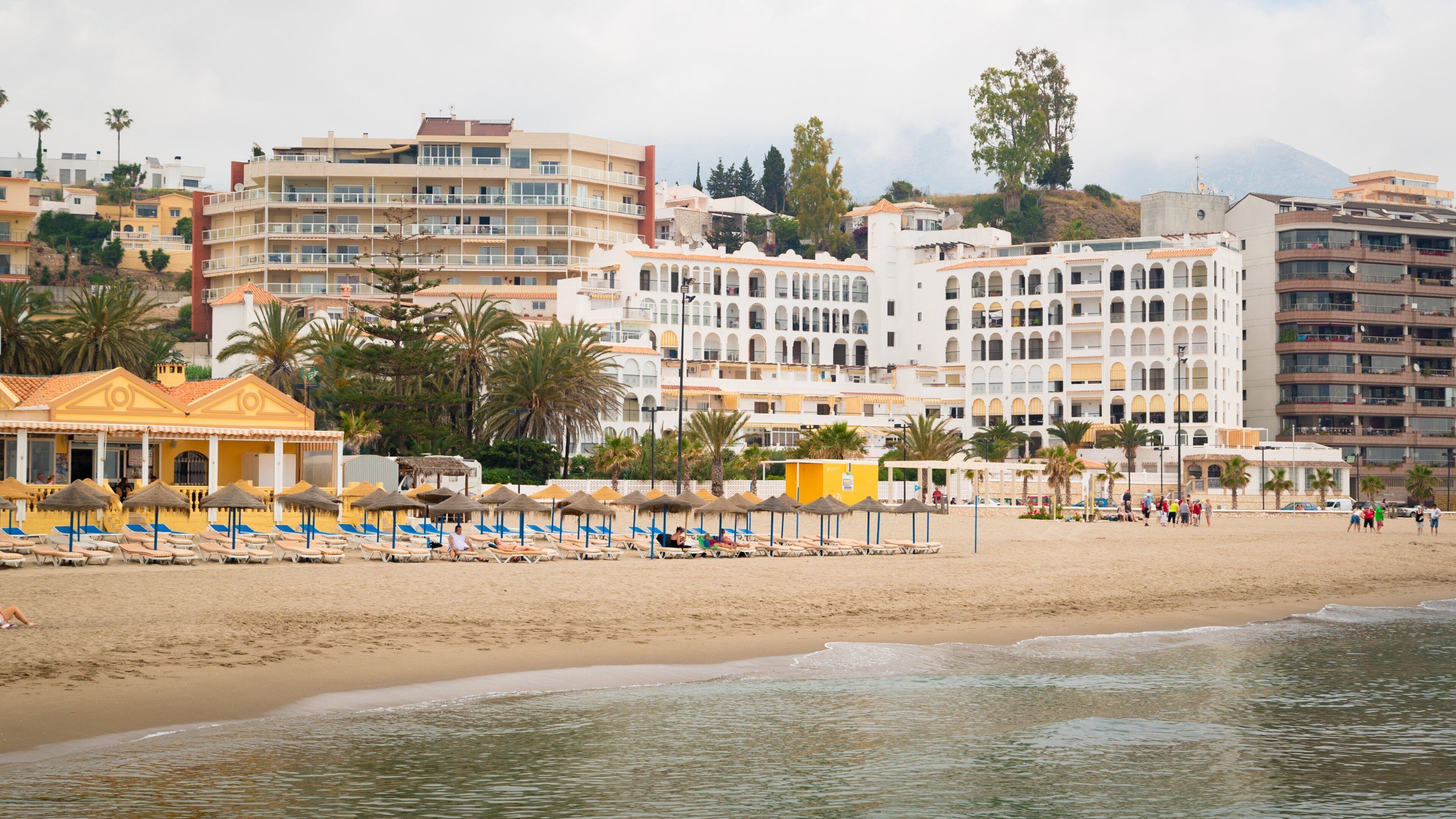 Torreblanca Beach showing a sandy beach, general coastal views and a coastal town