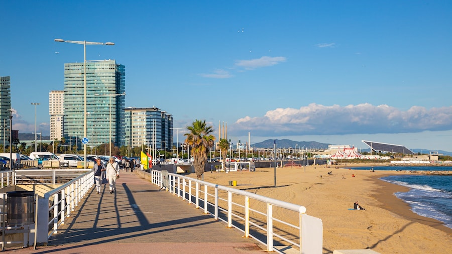 Mar Bella Beach showing a coastal town and a beach