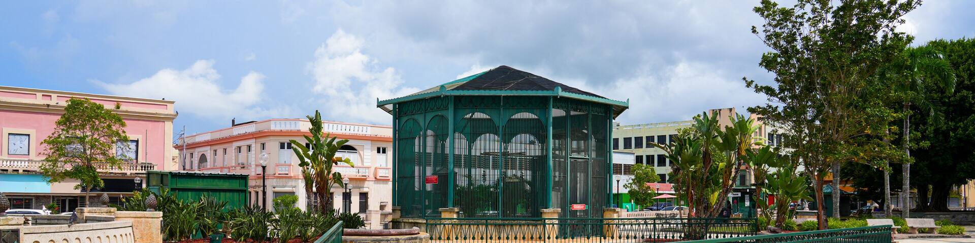 Parrot aviary on Plaza Santiago R. Palmer in the Old Town of Caguas in Puerto Rico, a US Territory in the Caribbean Islands