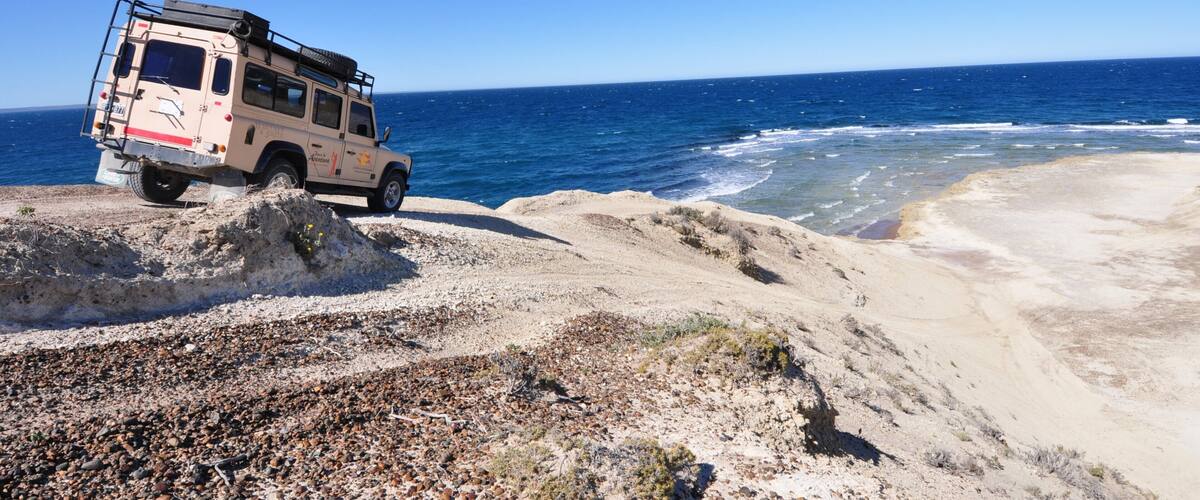 Chubut featuring off-road driving and general coastal views