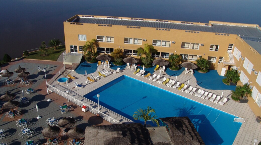 Santiago del Estero showing a pool, a hotel and a luxury hotel or resort