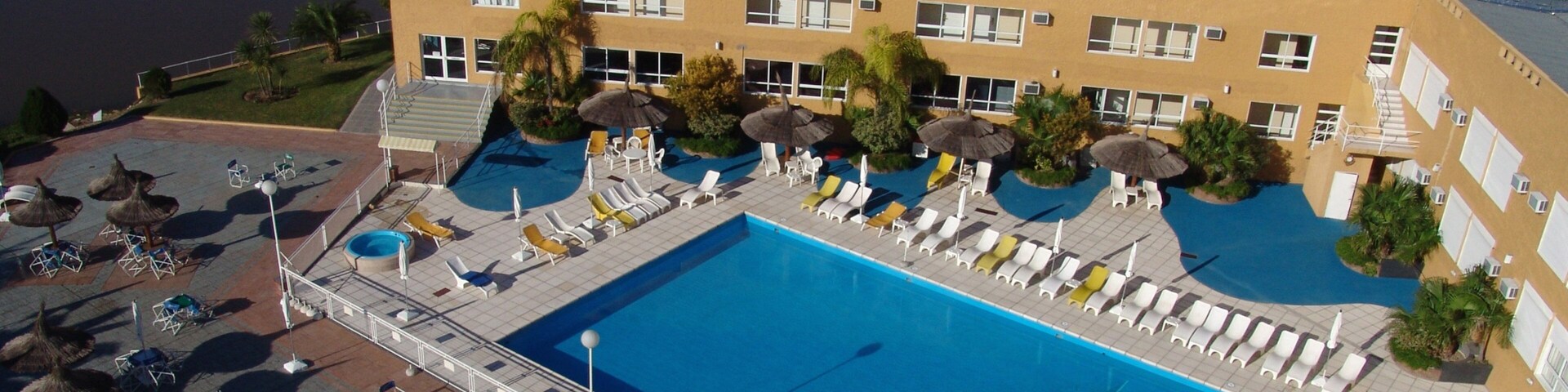 Santiago del Estero showing a pool, a hotel and a luxury hotel or resort