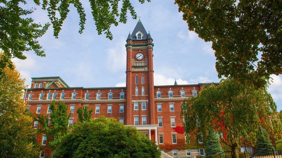 O'Kane Hall in College of the Holy Cross with fall foliage in city of Worcester, Massachusetts MA, USA.