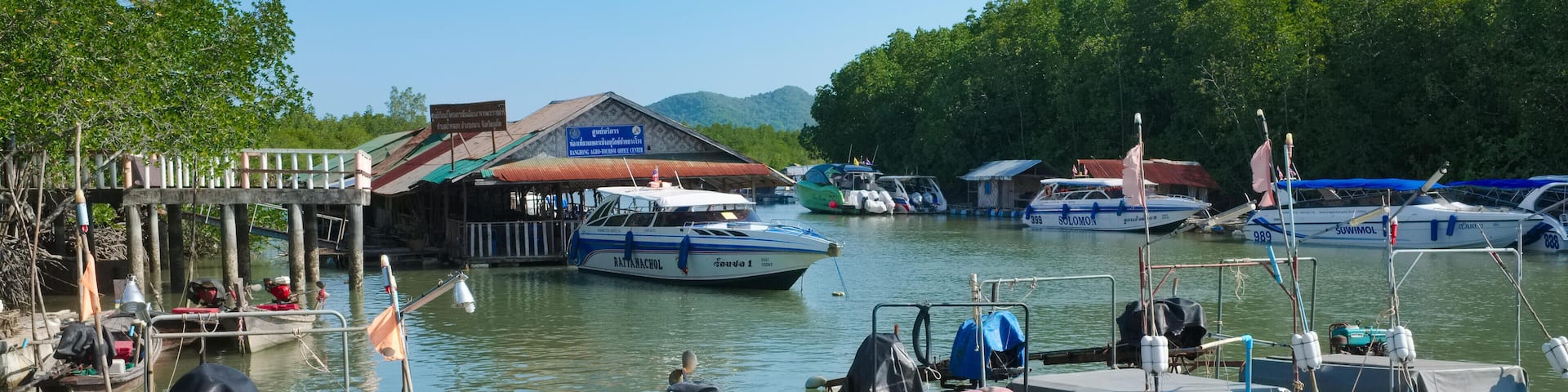 The pier at Bang Rong, Phuket, Thailand, with boats going to Ko Yao Noi, Ko Yao Yai and other outlying islands