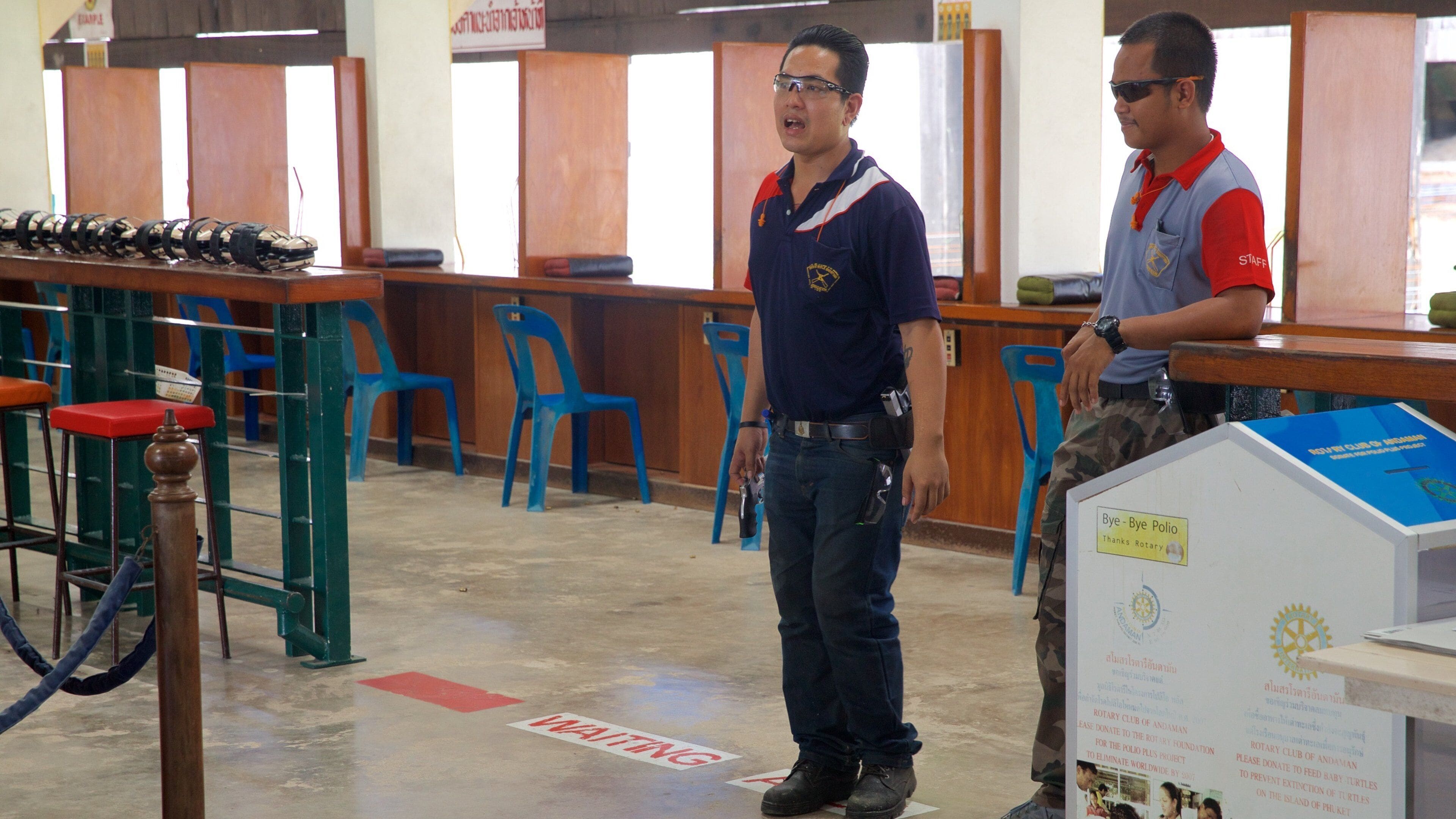 Phuket Shooting Range which includes interior views as well as an individual male