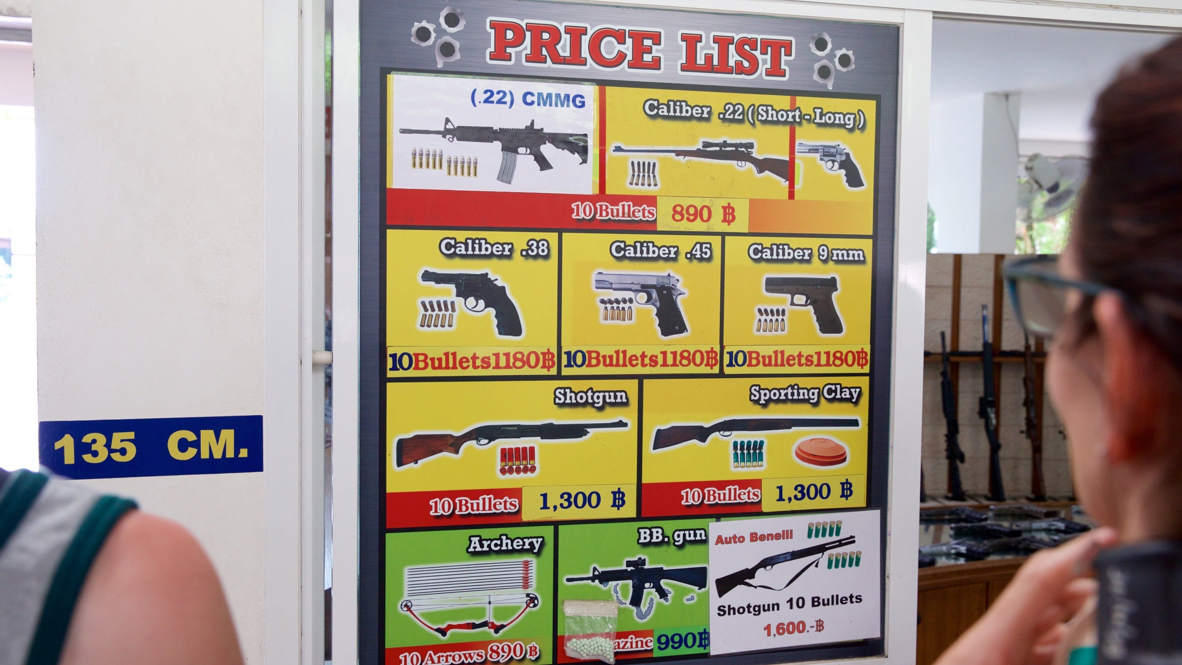 Phuket Shooting Range which includes signage and interior views