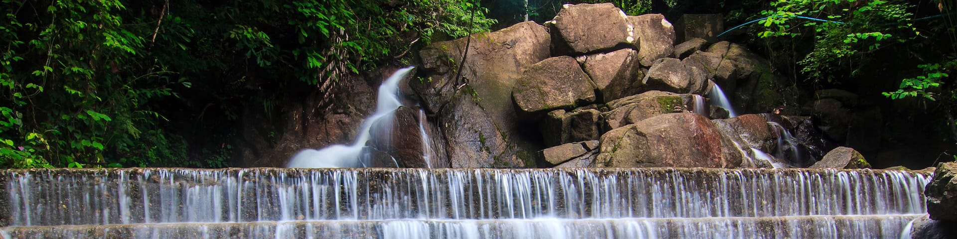 Beautiful nature of Kathu Waterfall at Phuket province Thailand.; Shutterstock ID 666841453; Purchase Order: SP-2378; Order Number: Vietnam/Phuket Go Guides Dec 19; Client/Licensee: Hotels.com - Lee B