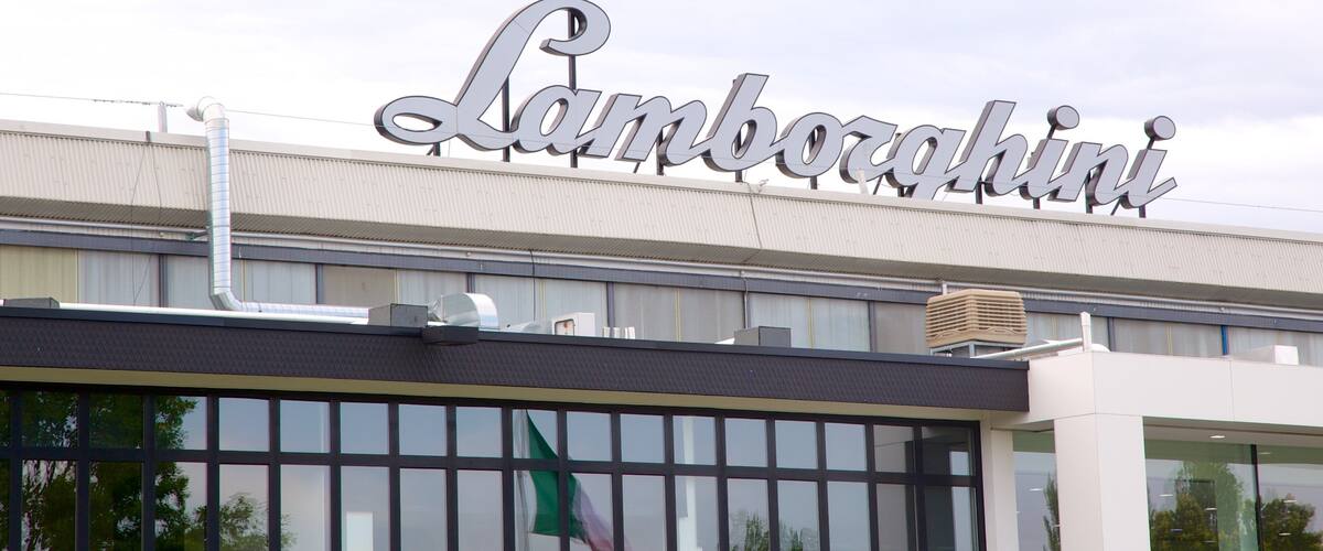 A building with a large sign that reads "Lamborghini".