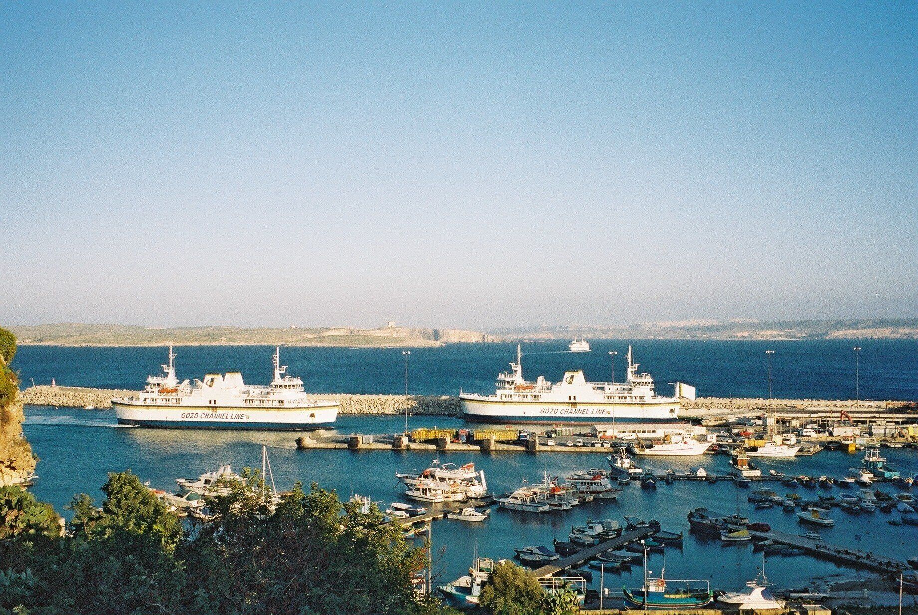 View from the Grand Hotel, Mgarr across the harbour to Comino and Malta