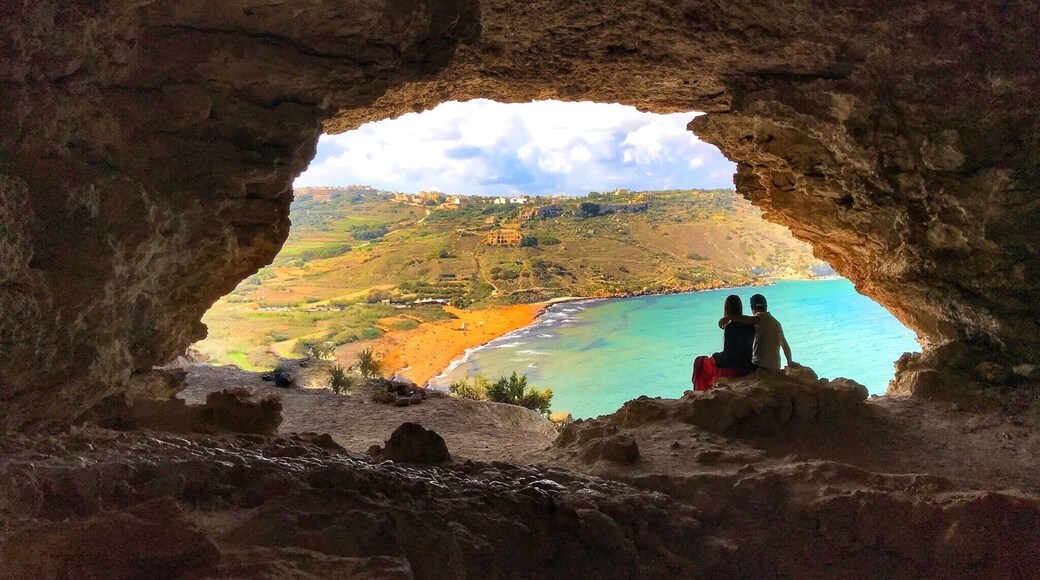 Malta is full of beautiful stops! This cave overlooks Ramla Bay. The view is out of this world! Perfect to enjoy with a loved one. There are signs of people camping inside of the cave which could make for a fun #Adventure with your group while in Malta! There are two access points: 1. from the street and 2. walking up from Ramla Bay beach! Get yourself here and admire the view!