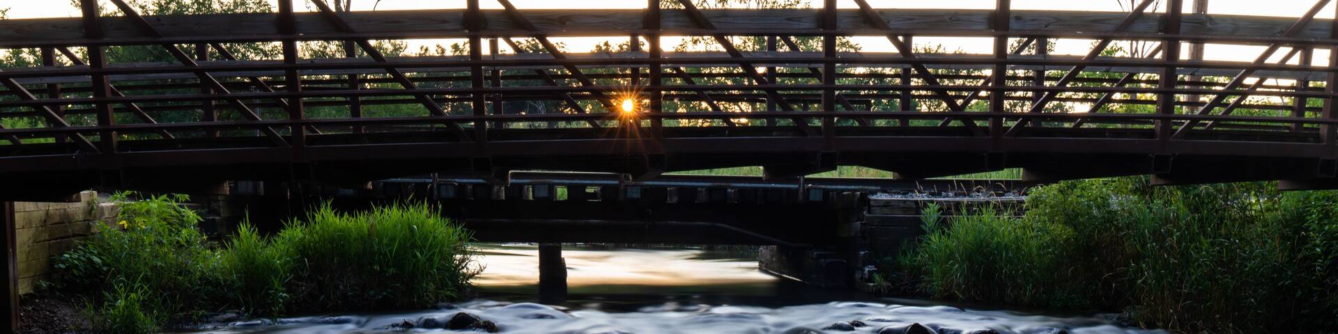 bridge over stream at portage creek bicentennial park in Michigan