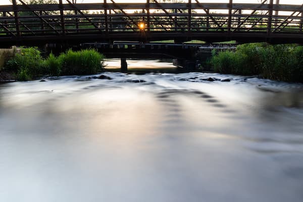bridge over stream at portage creek bicentennial park in Michigan