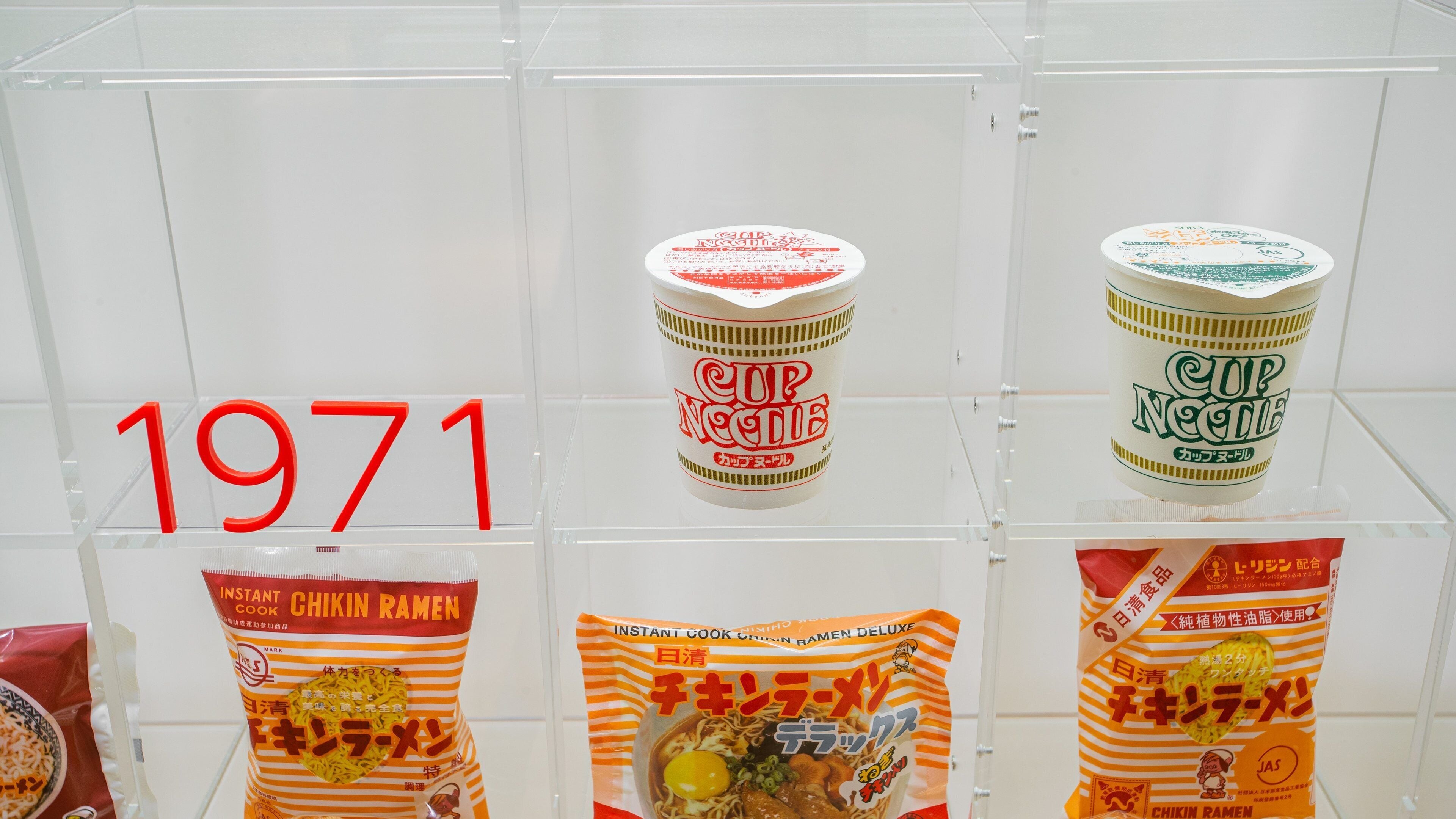 Instant ramen packages and a 'Cup Noodle' canister from 1971.