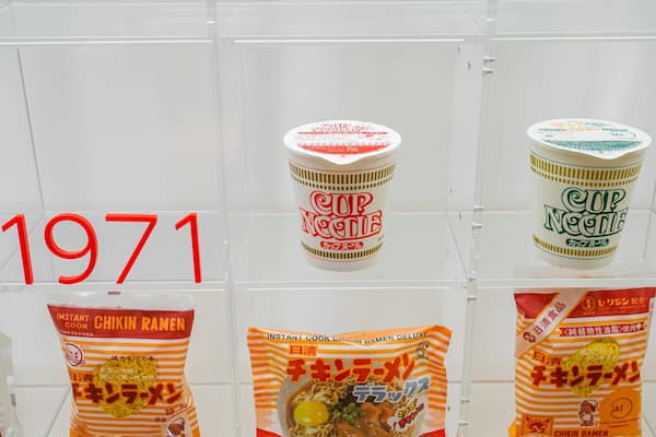 Instant ramen packages and a 'Cup Noodle' canister from 1971.
