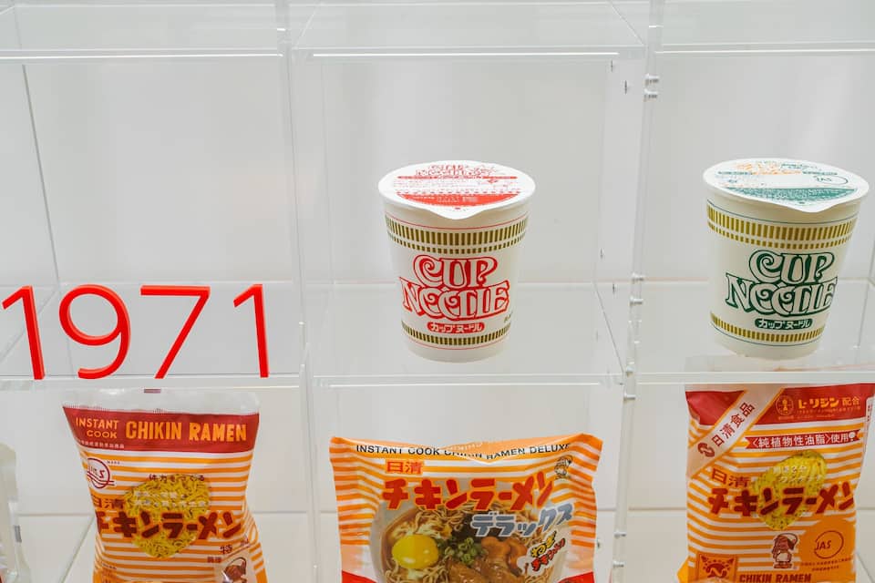 Instant ramen packages and a 'Cup Noodle' canister from 1971.