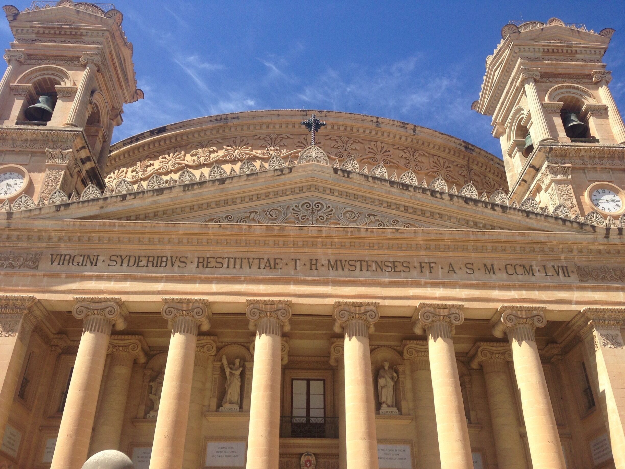 During WWII a bomb fell through the center skylight during a service and no one was injured. The Mosta Miracle