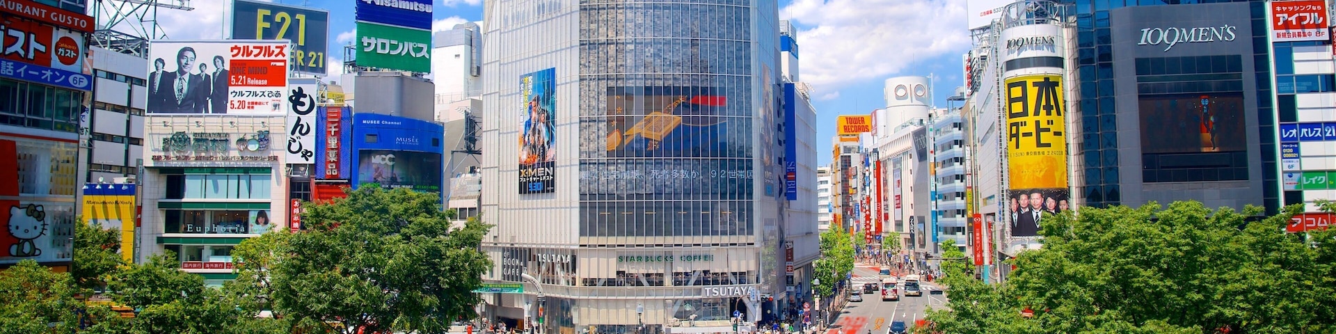 Shibuya Crossing featuring a city, a square or plaza and modern architecture