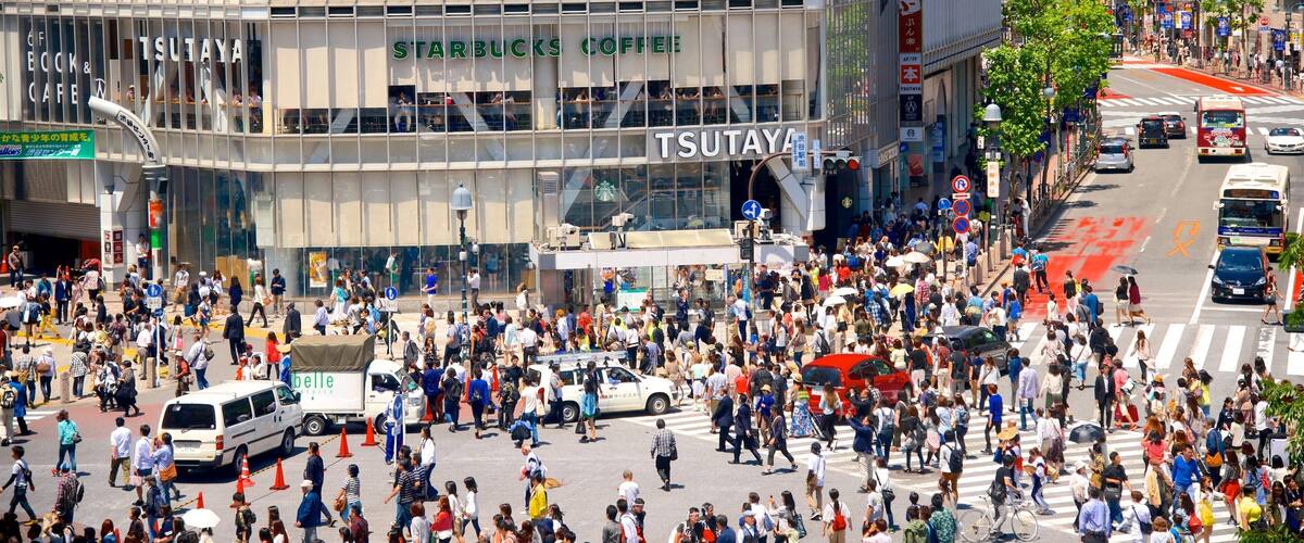 Shibuya Crossing showing street scenes, a city and signage