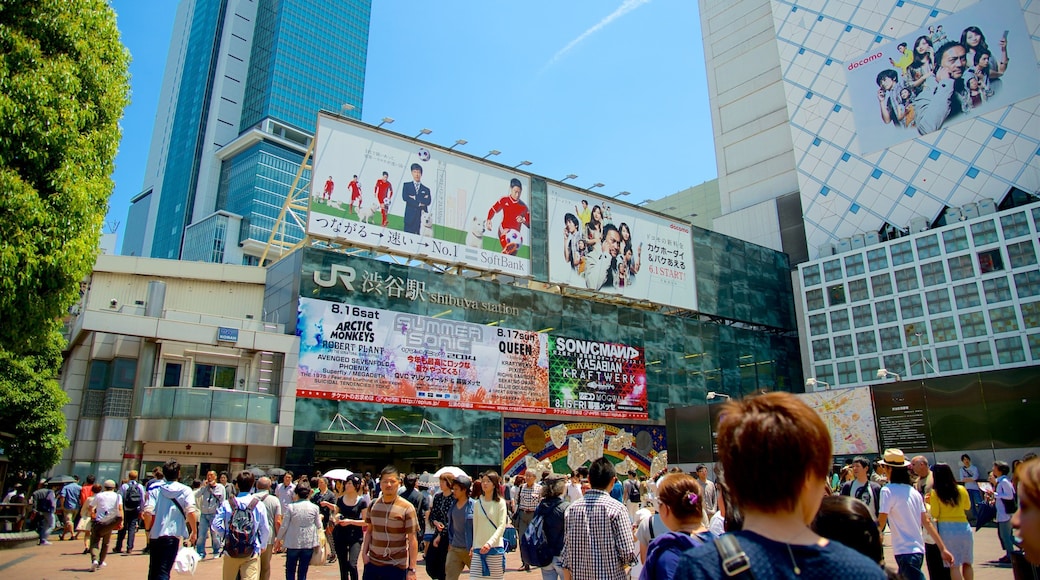 Shibuya-krydset som viser en by, det centrale forretningsområde og skiltning