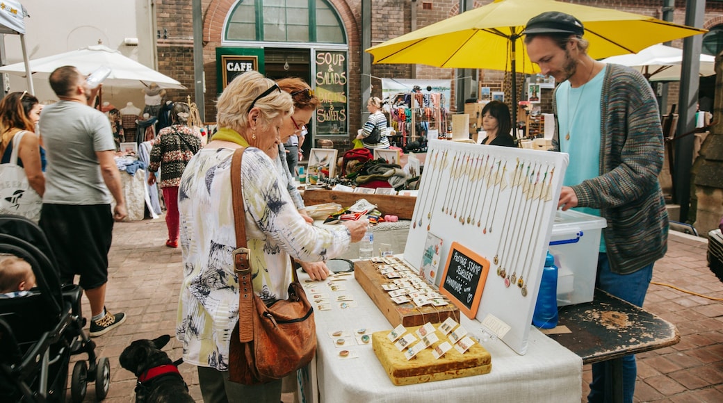 Paddington Markets featuring markets as well as an individual male