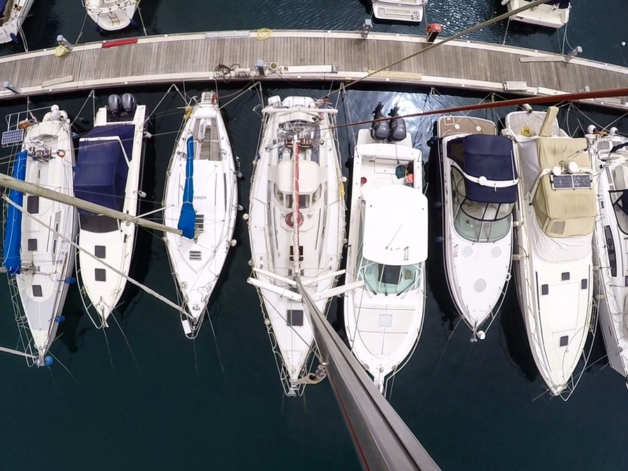 View to the boats in marina from top of the mast