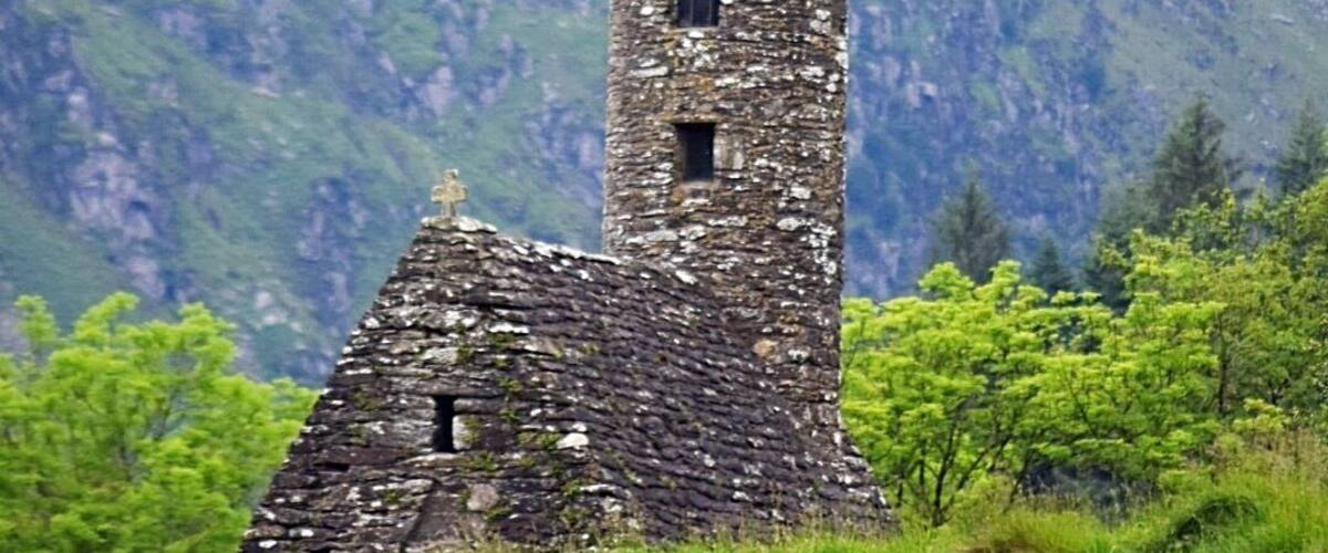 Visited Glendalough while on our pilgrimage. June 10 -19- 2017
Glendalough is a glacial valley in County Wicklow, Ireland, renowned for an Early Medieval monastic settlement founded in the 6th century by Saint Kevin.
Discover the Monastic City under the last remaining double-arched granite gateway into sanctified ground where travelers would come in search of teaching from the learned monks and scholars that lived here between the 10th-13th century AD.
Enjoy the scenic walks through oak forests, along lake-shore, or up steep mountain trail to reach panoramic views looking out over the valley