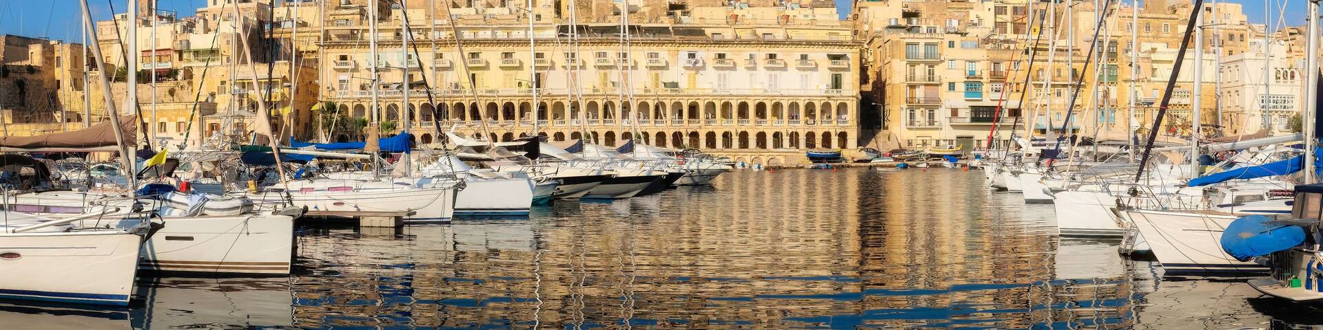 Sailing boats on Senglea marina in Grand Bay, Valetta, Malta