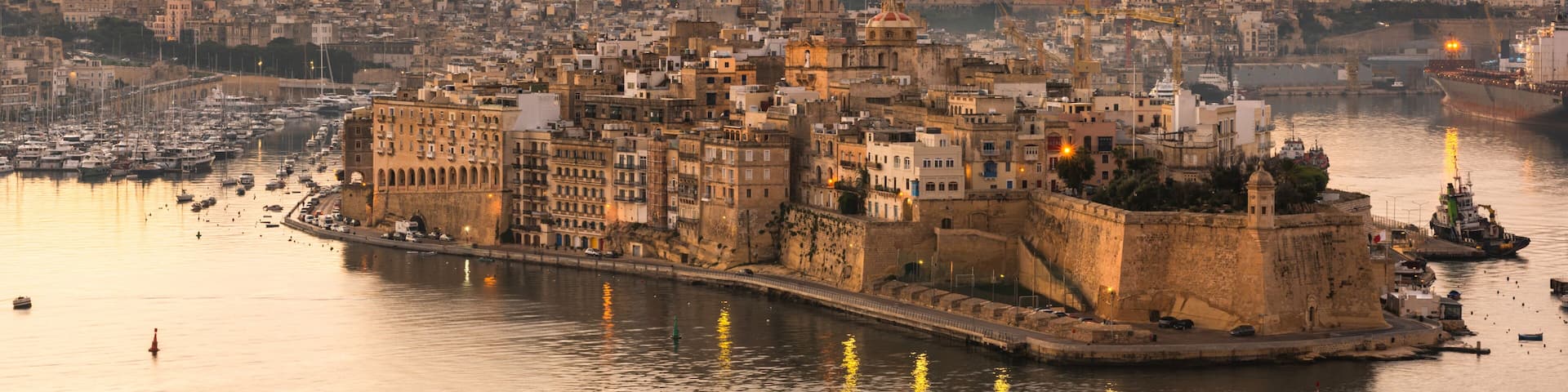 Illuminated skyline of Senglea at sunrise,Malta. One of Three Cities in Grand Harbour