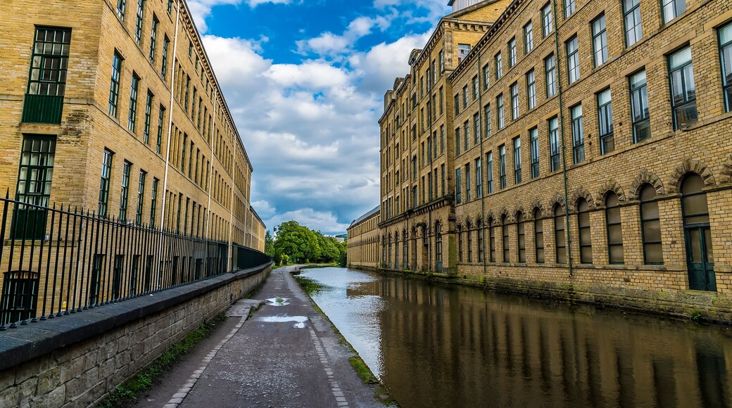 A view down an urban canyon in the model village of Saltaire, Yorkshire, UK in summertime