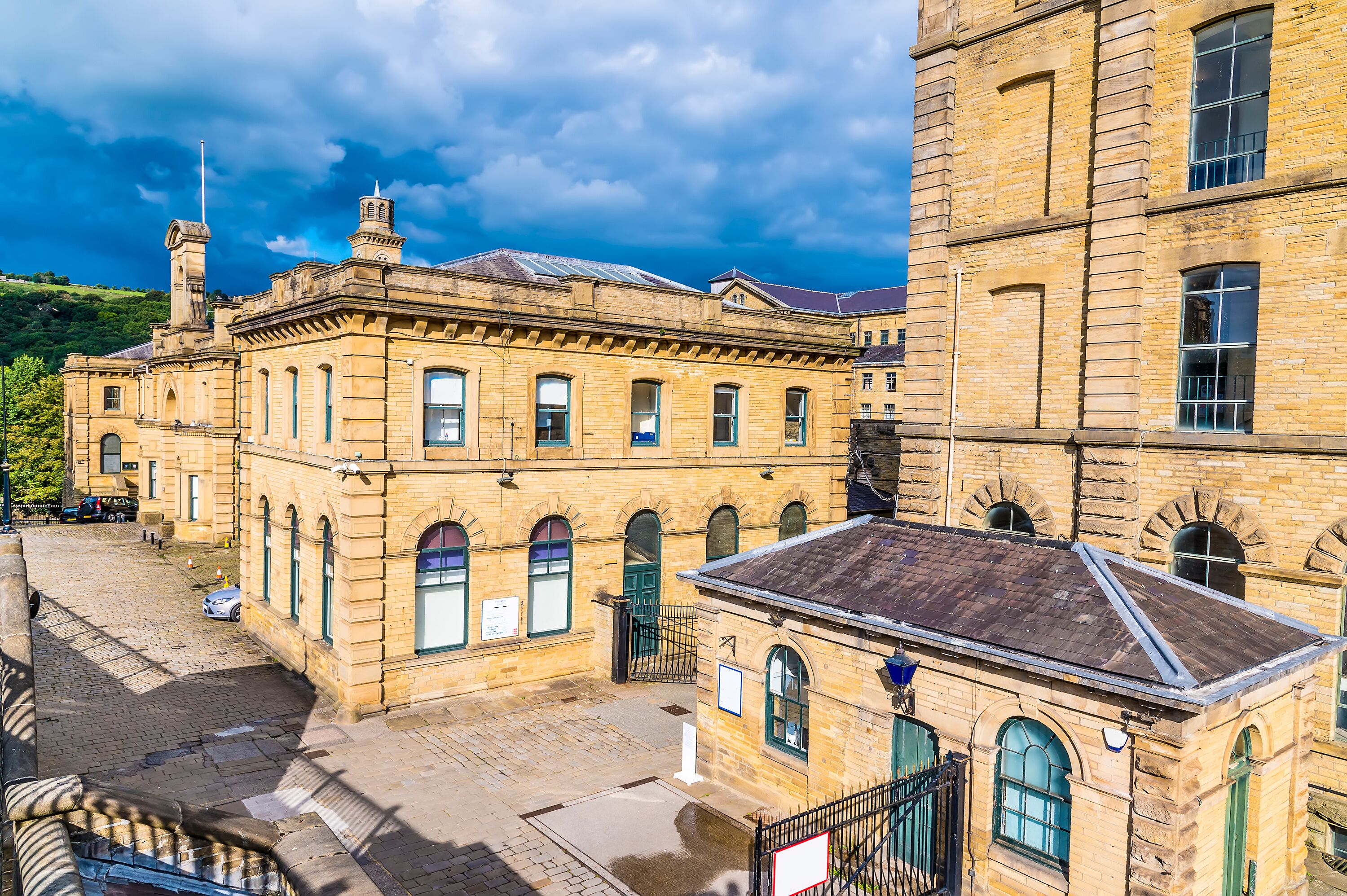 A historic building with arched windows and a brick facade.
