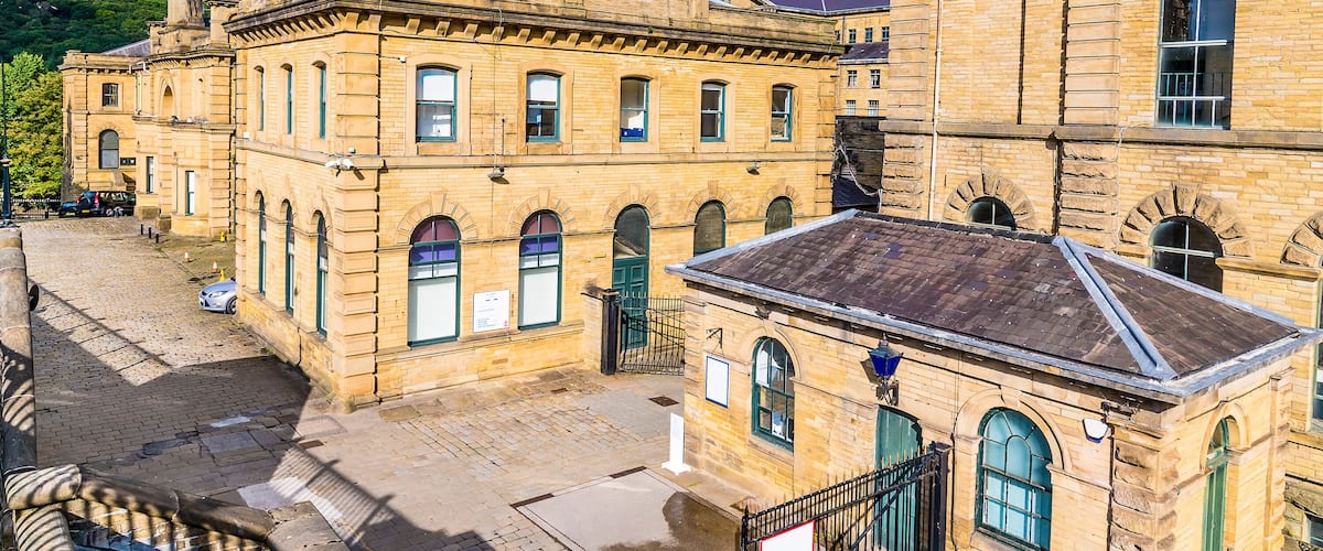 A historic building with arched windows and a brick facade.