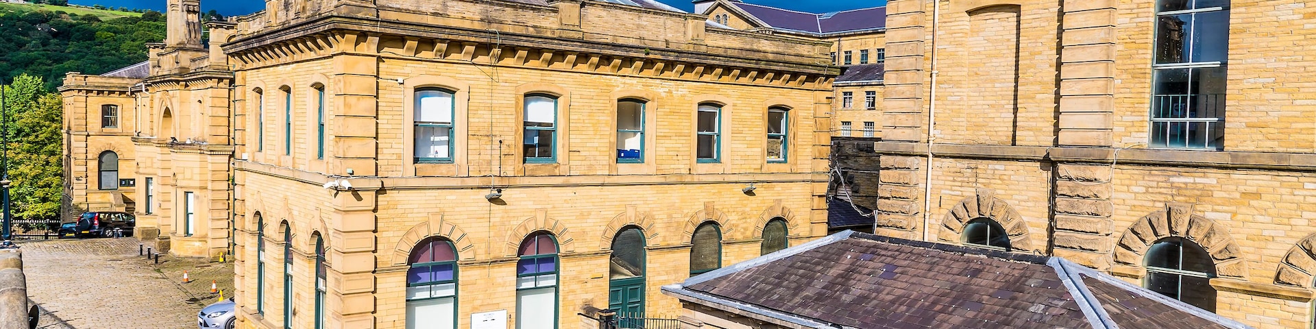 A historic building with arched windows and a brick facade.